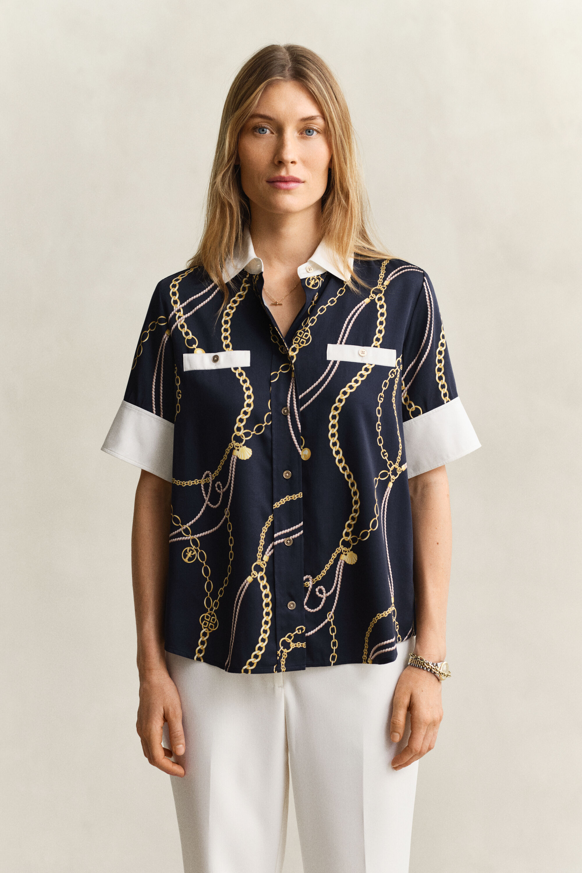 Blusa con dettagli a contrasto