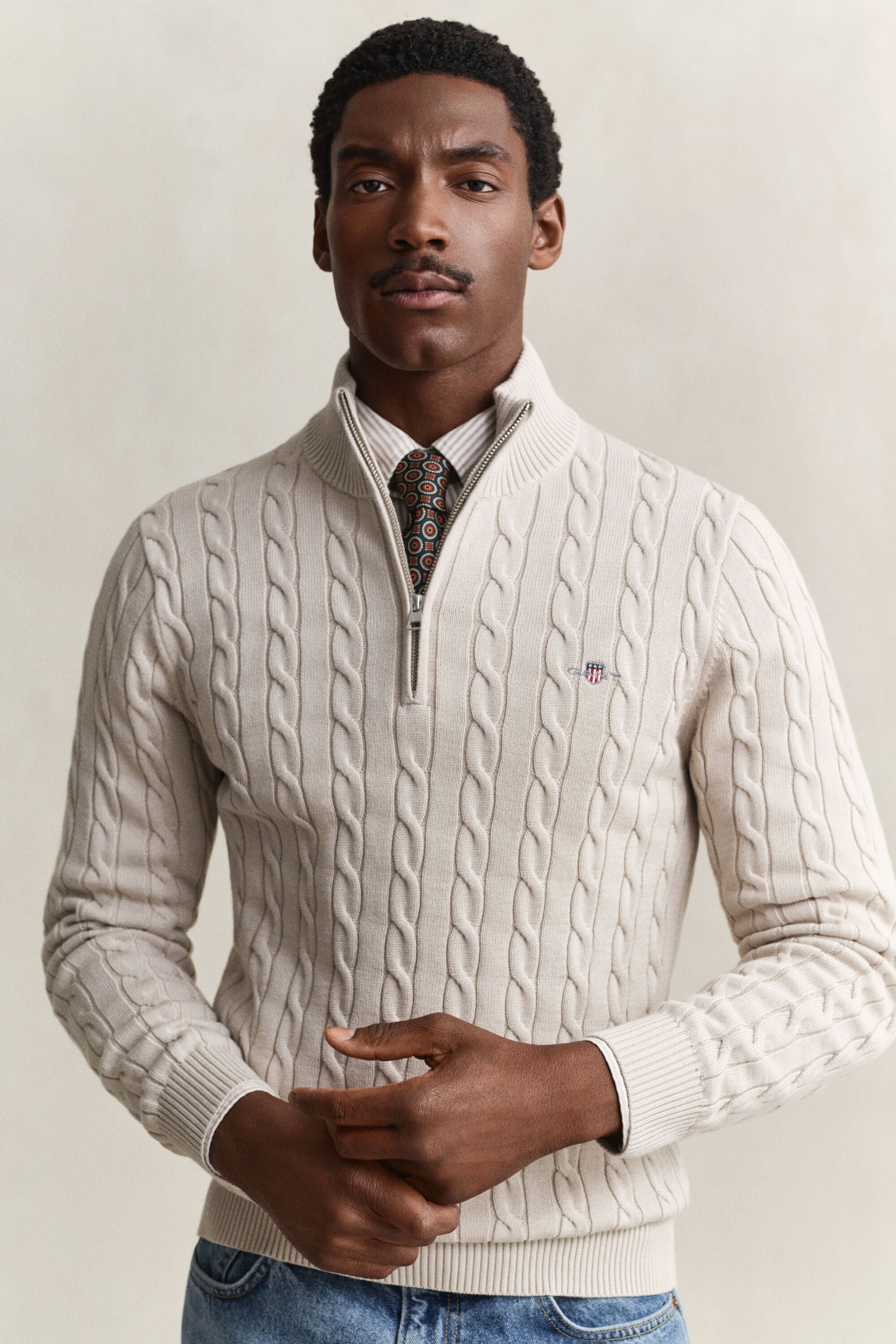 Maglia con zip corta in cotone a trecce