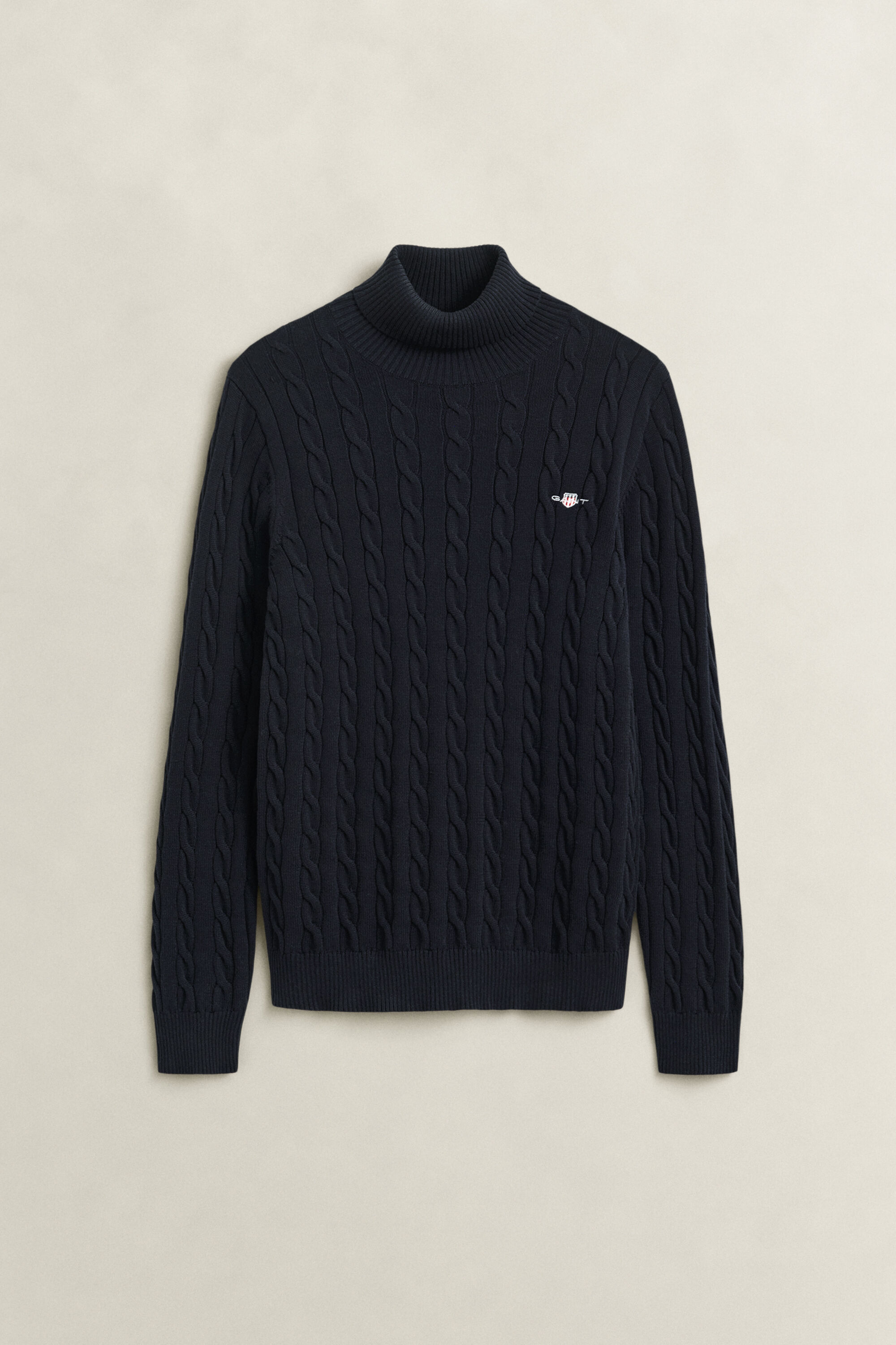 Maglia a collo alto in cotone a trecce