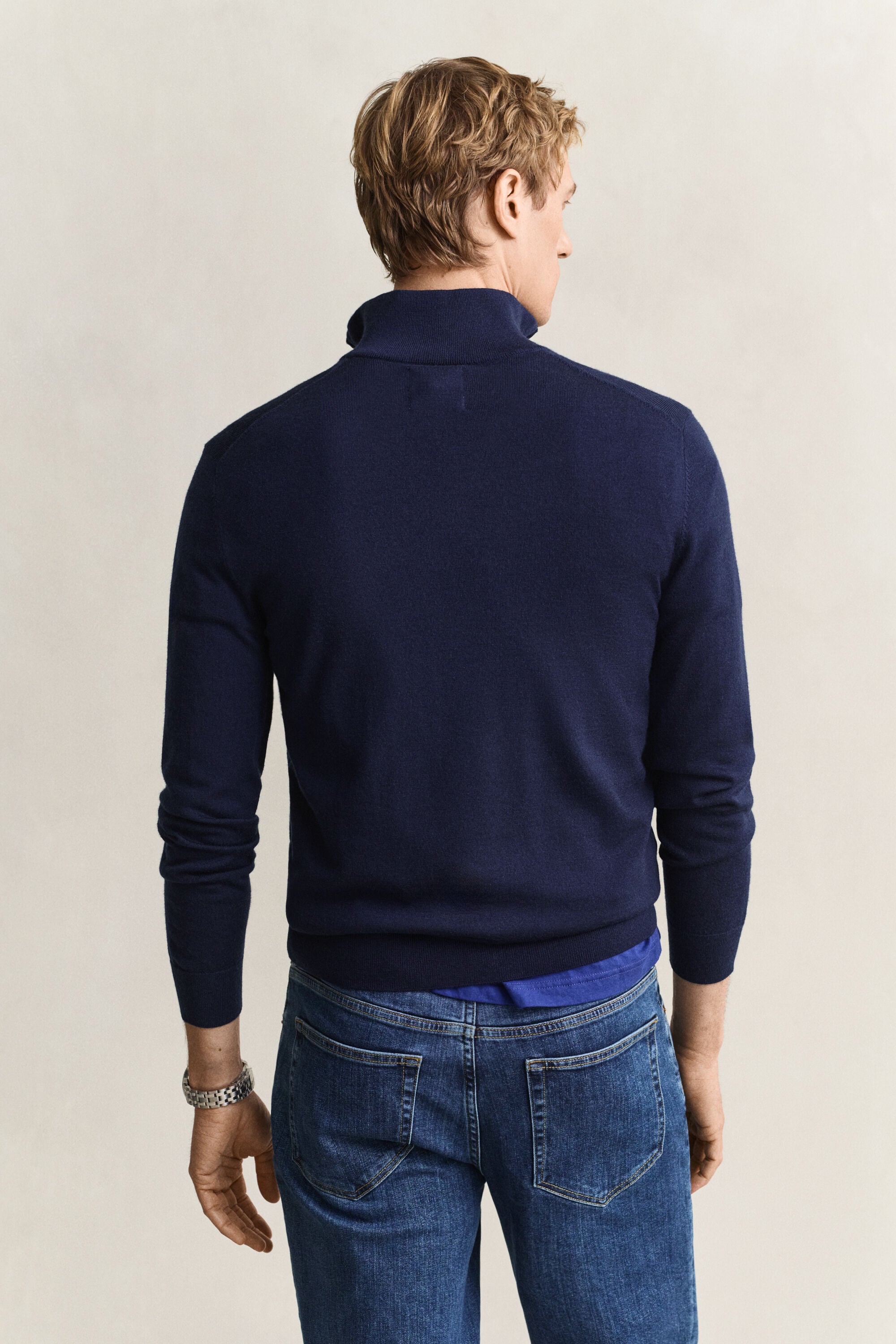 Maglia in lana merino a coste con zip corta