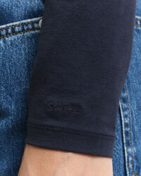 Top a maniche lunghe con scollo rotondo