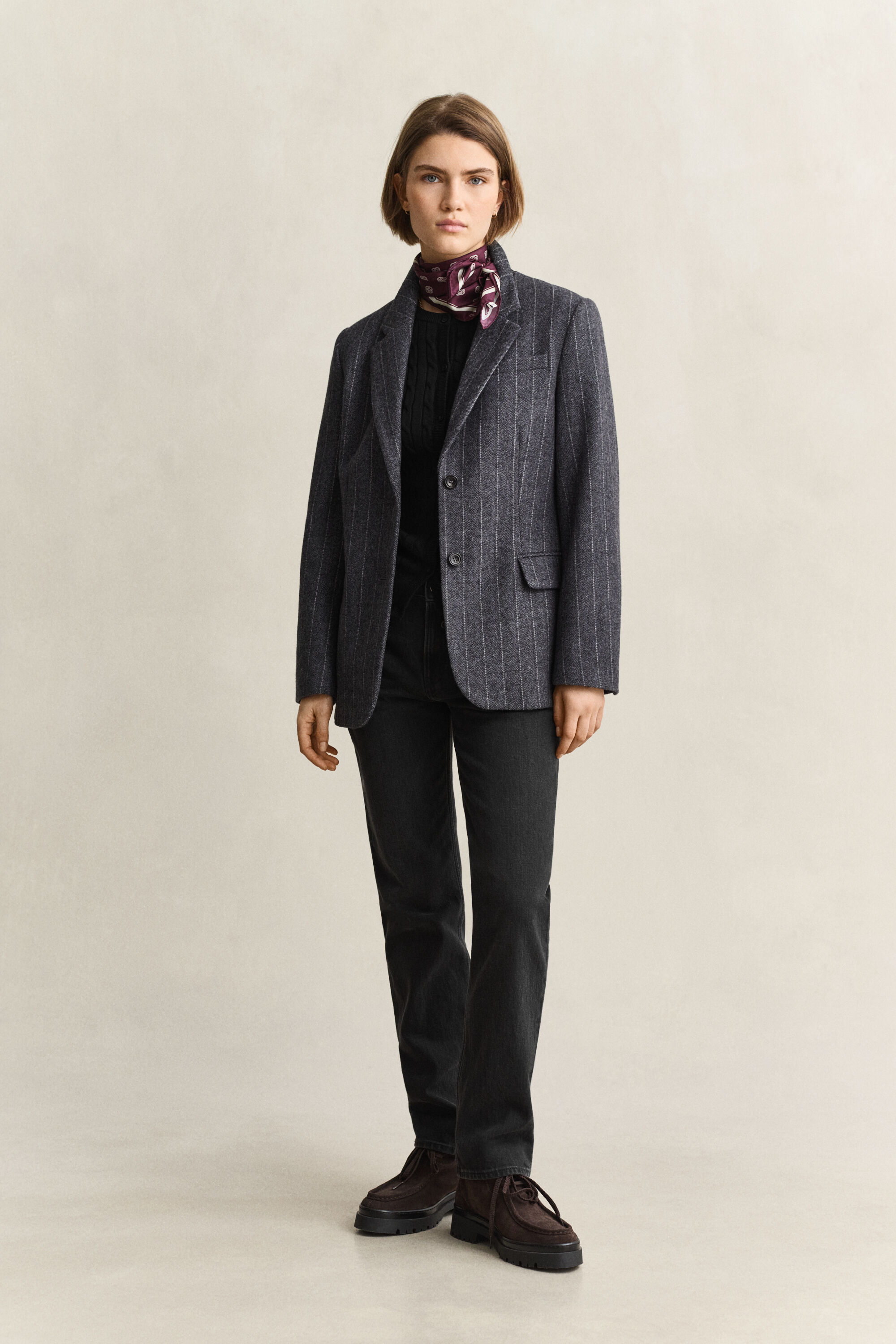Cardigan in maglia con lavorazione a trecce