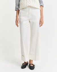 Pantaloni con piega e risvolto