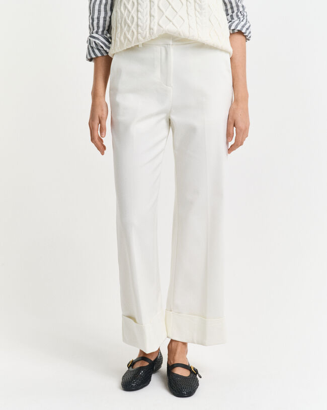 Pantaloni con piega e risvolto