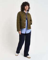 Piumino trapuntato con dettagli in velluto a coste