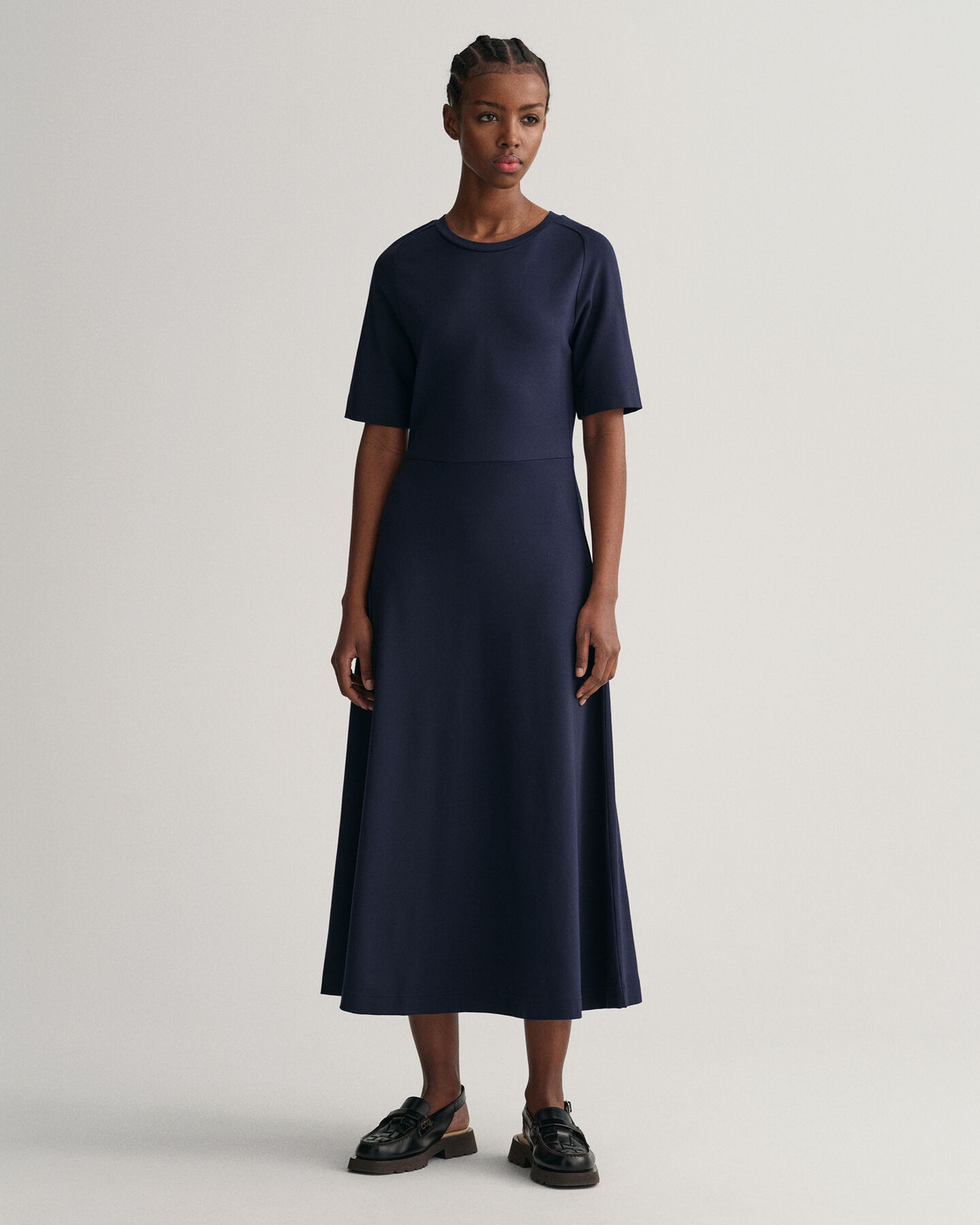 Maglia girocollo a maniche corte svasata