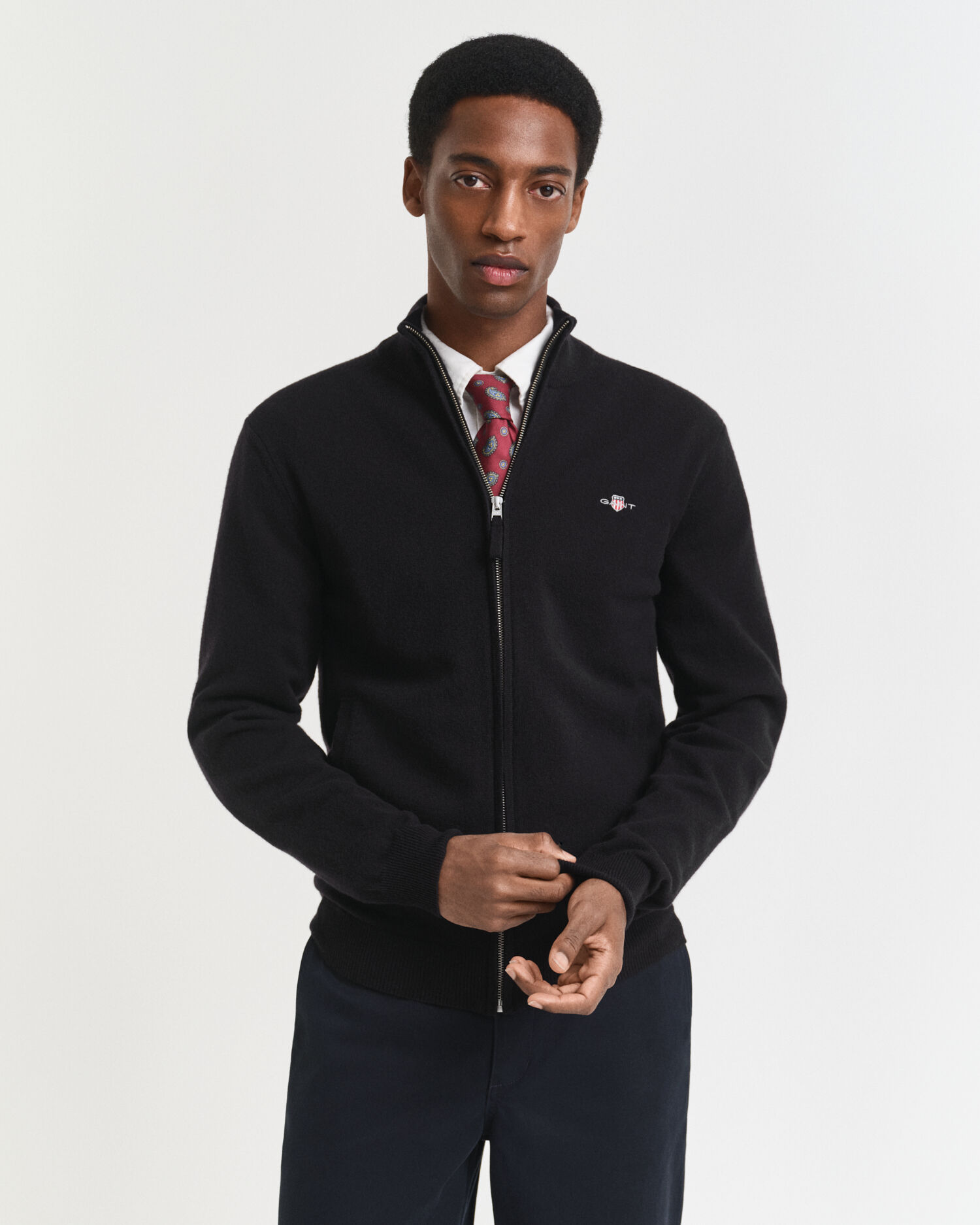 Cardigan con zip in finissima lana d’agnello