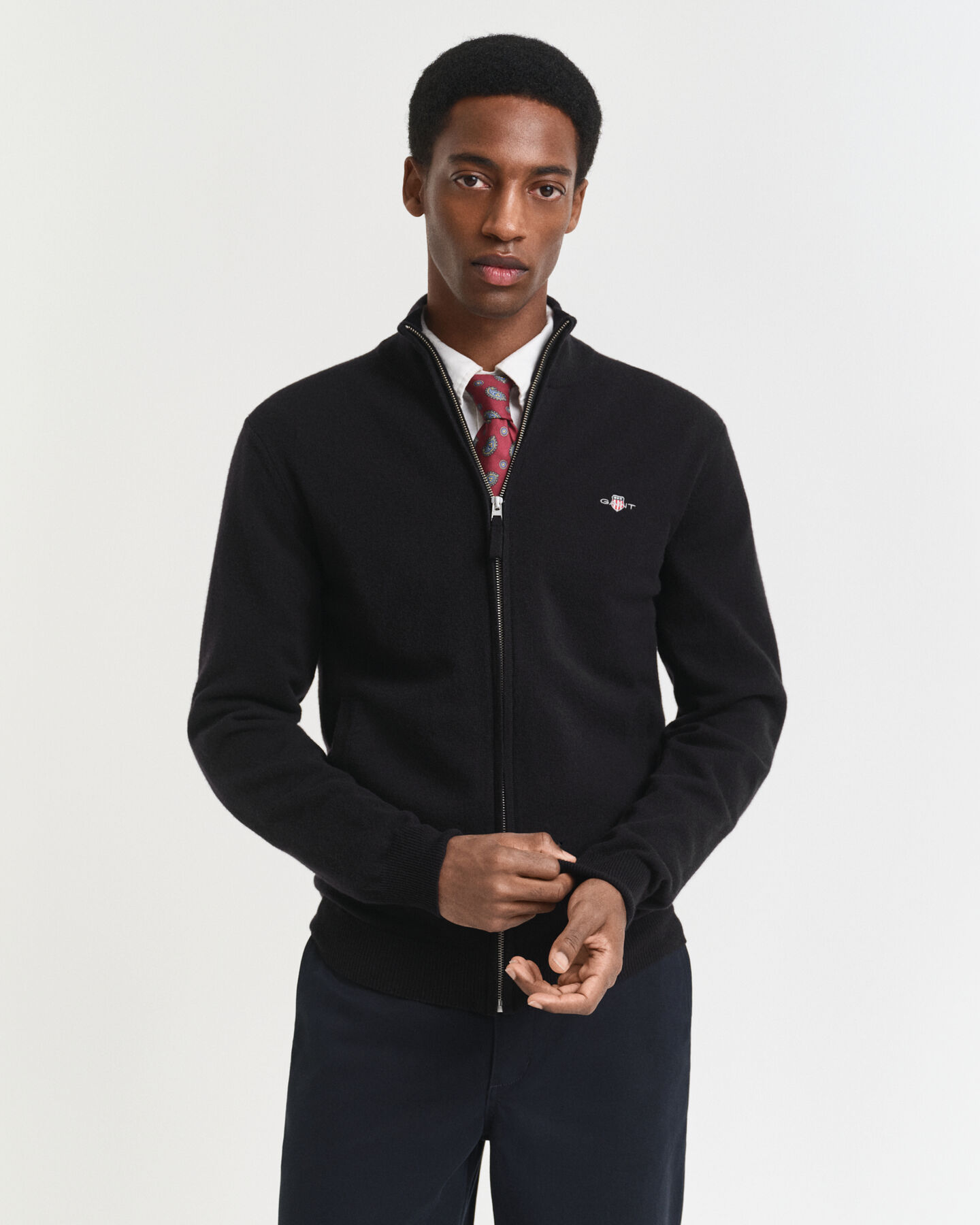 Cardigan con zip in finissima lana d’agnello