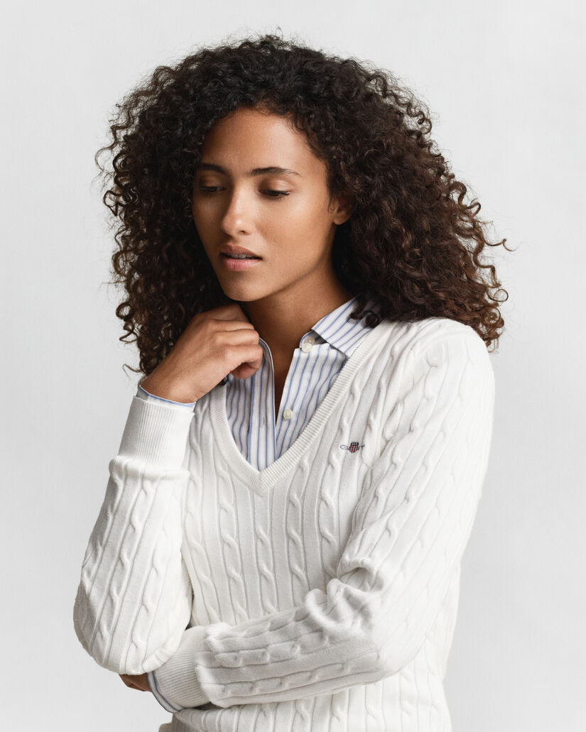 Maglia con scollo a V in cotone elasticizzato a trecce