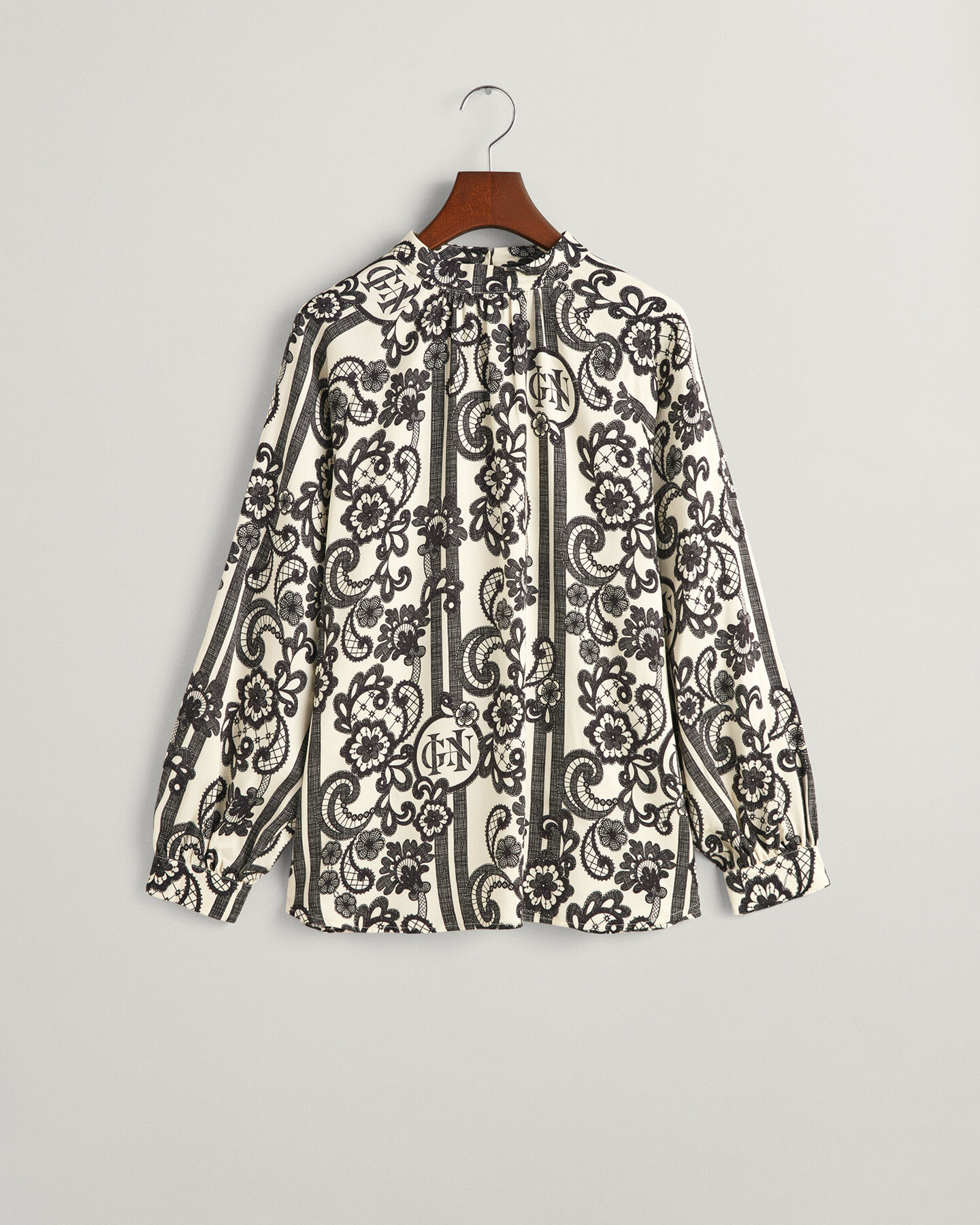 Blusa a collo alto con stampa Lace