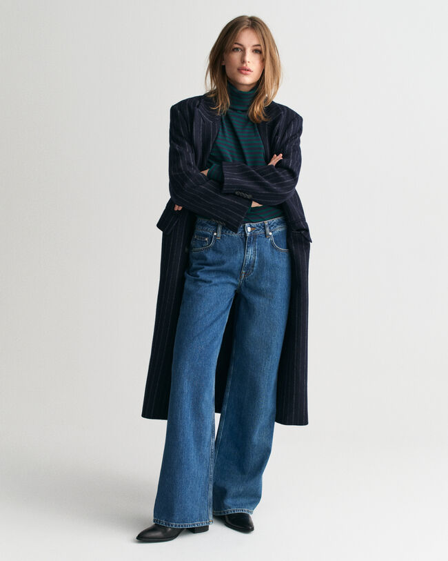 Collo alto a coste e maniche lunghe a righe