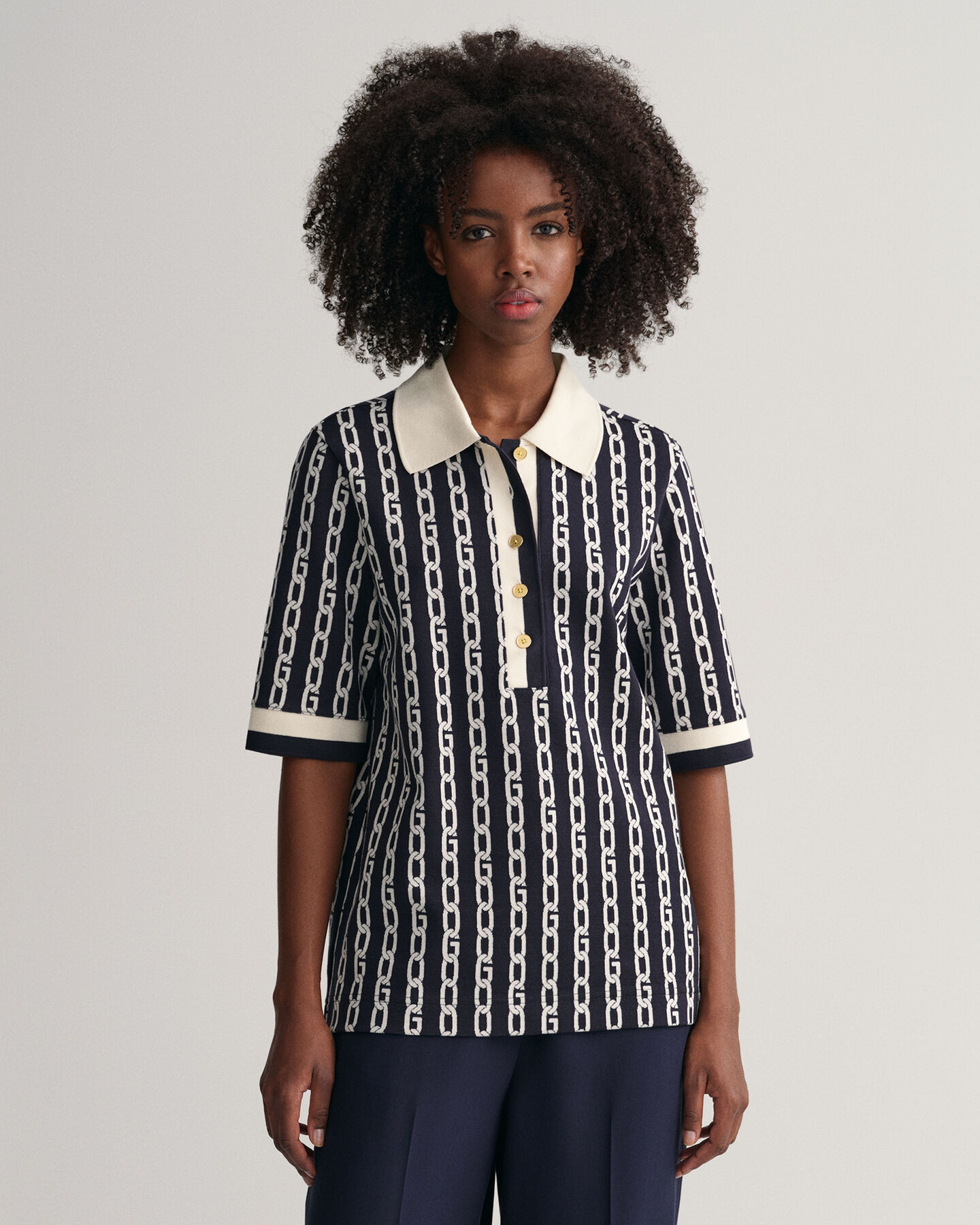 Polo a mezza manica e jacquard con catena