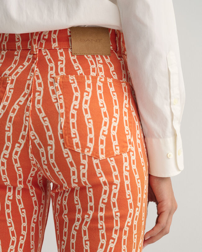 Jeans alla caviglia con stampa a catena