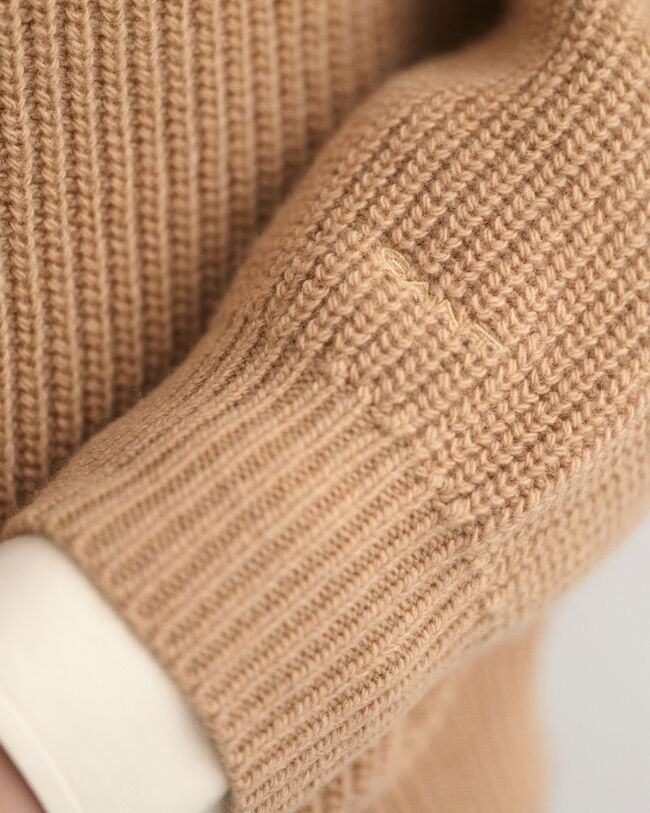 Maglia con scollo a V a coste in lana