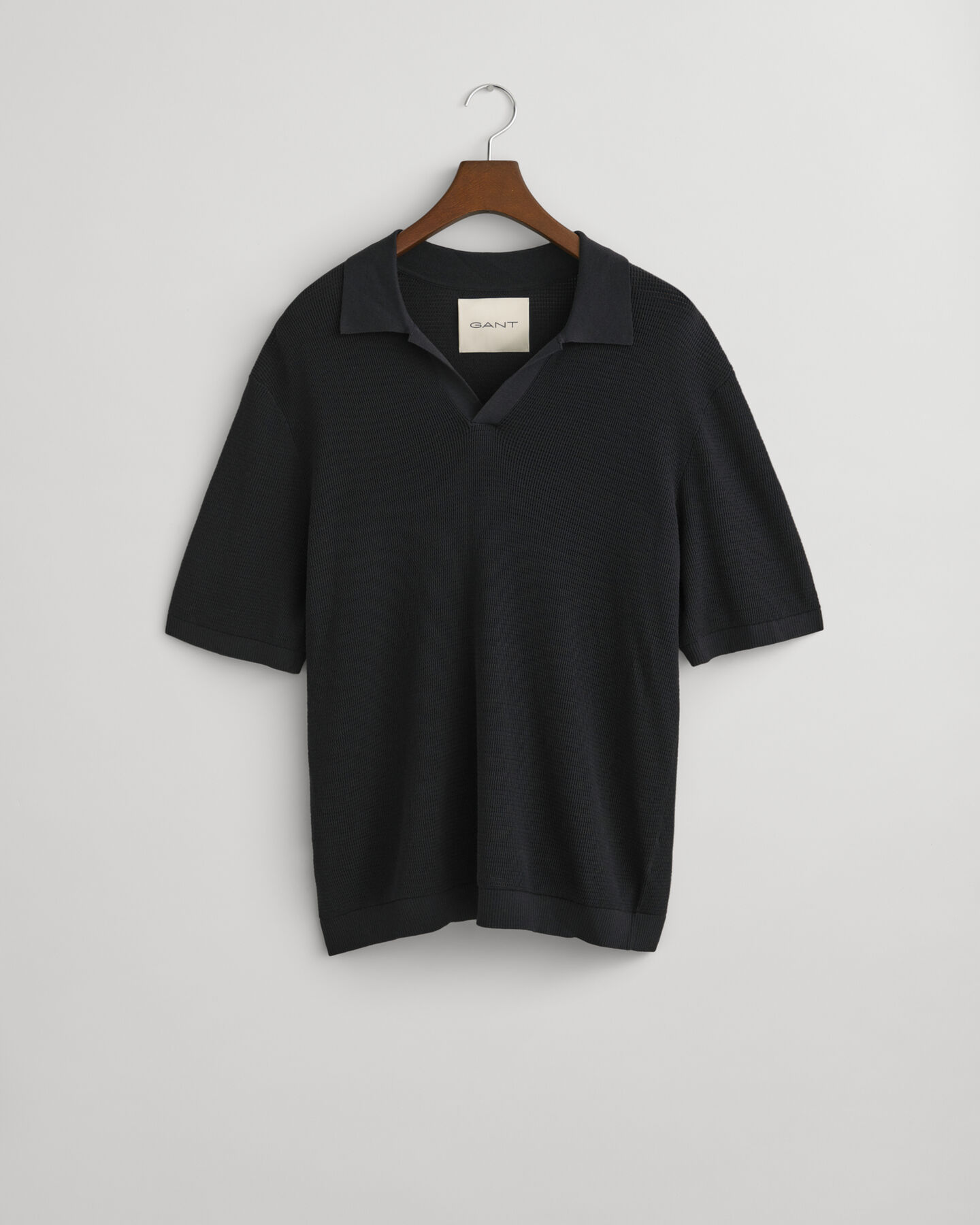 Polo in maglia aperta