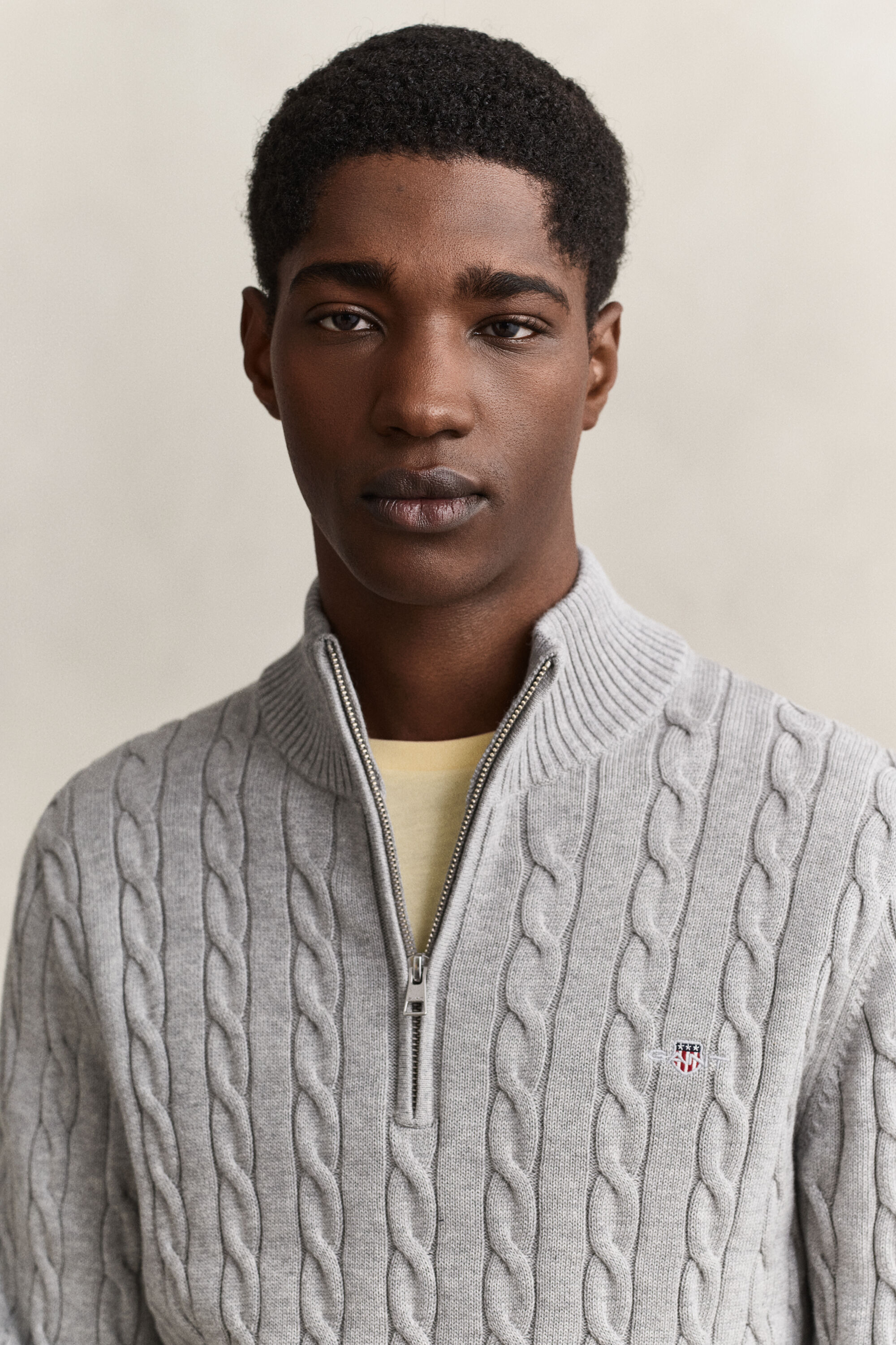 Maglia con zip corta in cotone a trecce