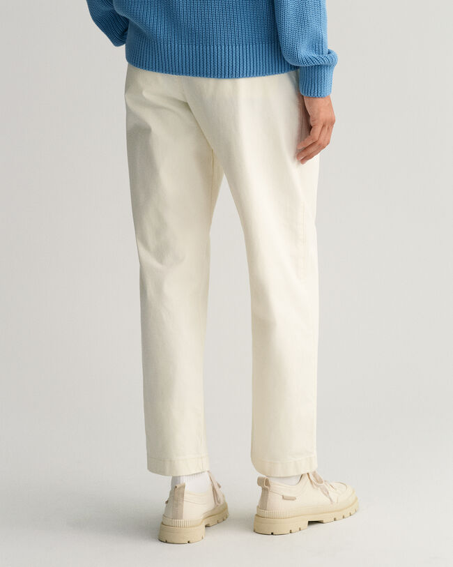 Pantaloni chino con pinces relaxed fit