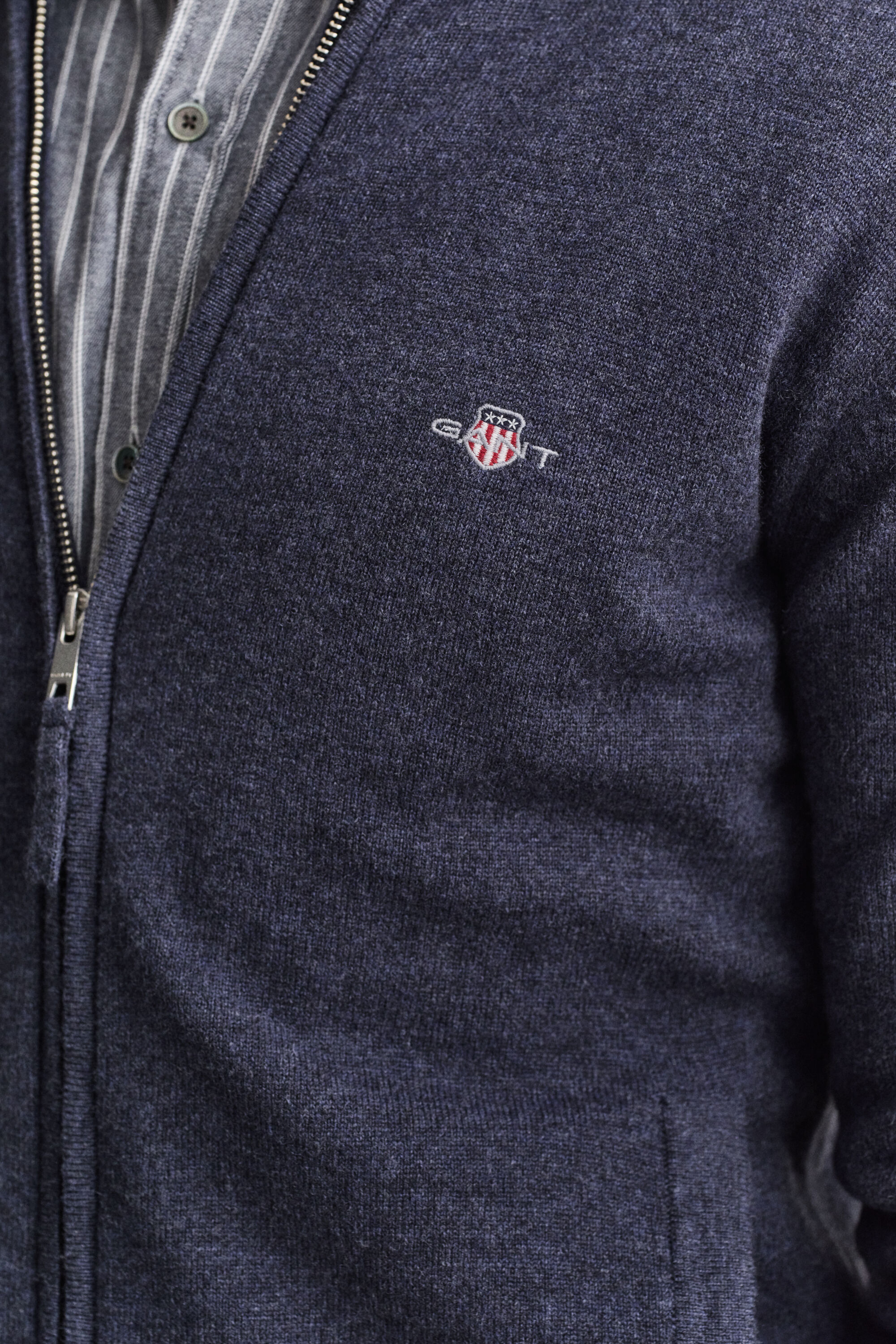 Cardigan con zip in lana d’agnello