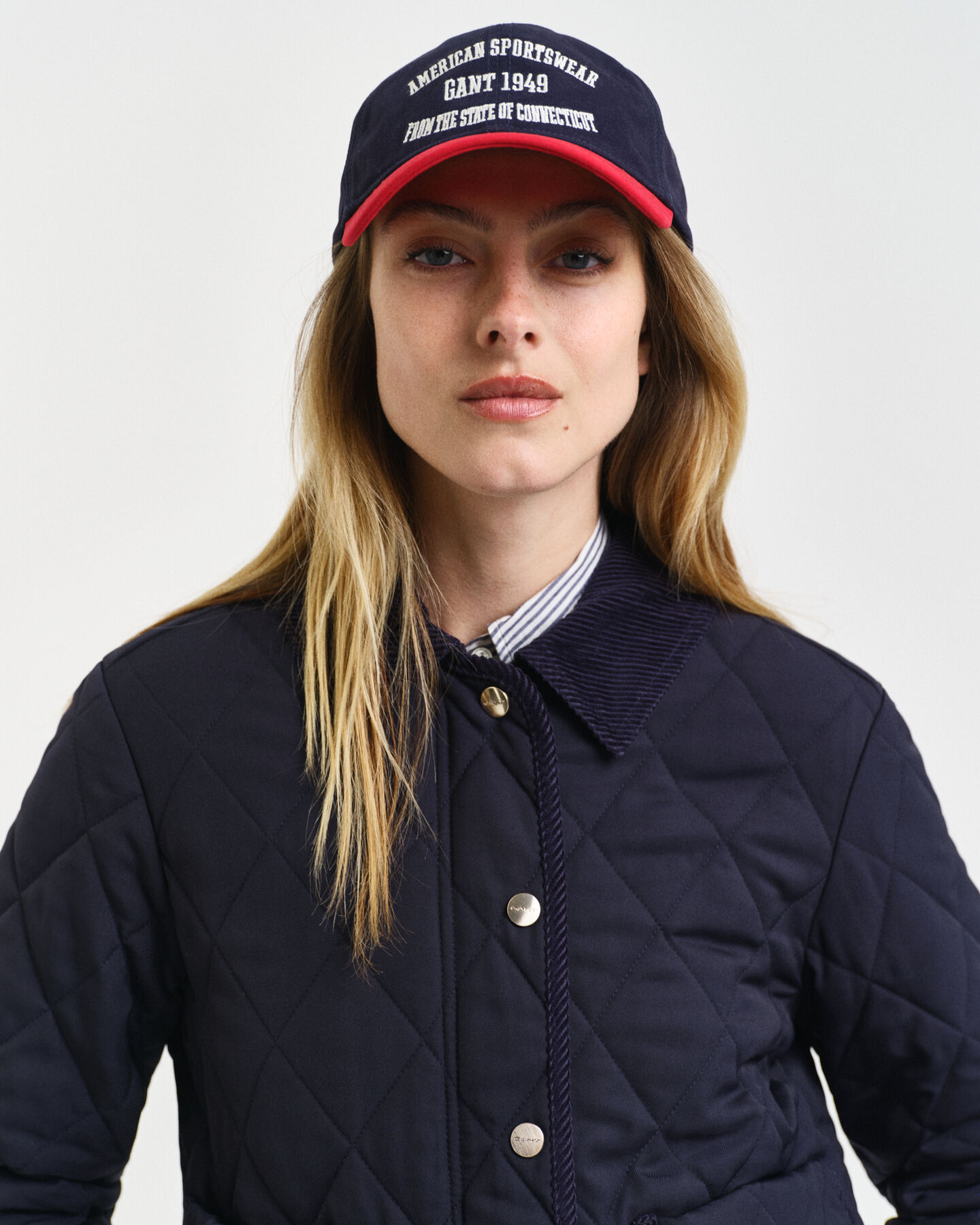 Piumino trapuntato con dettagli in velluto a coste