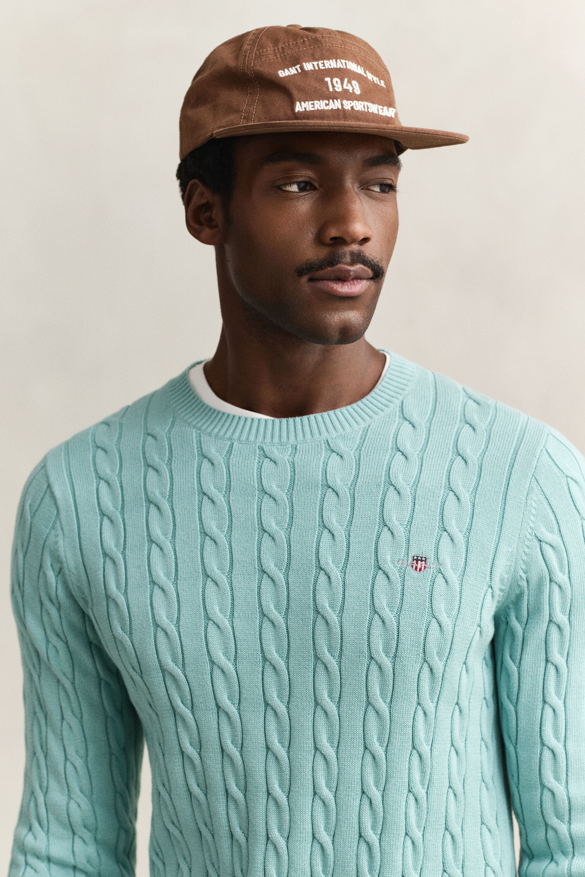 Maglia girocollo in cotone a trecce