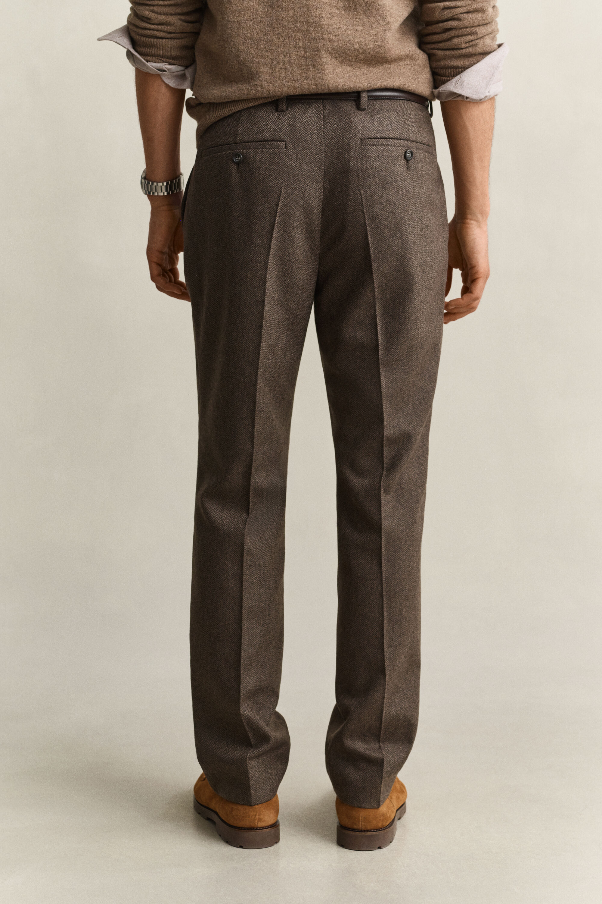 Pantaloni da abito con motivo a spina di pesce in lana