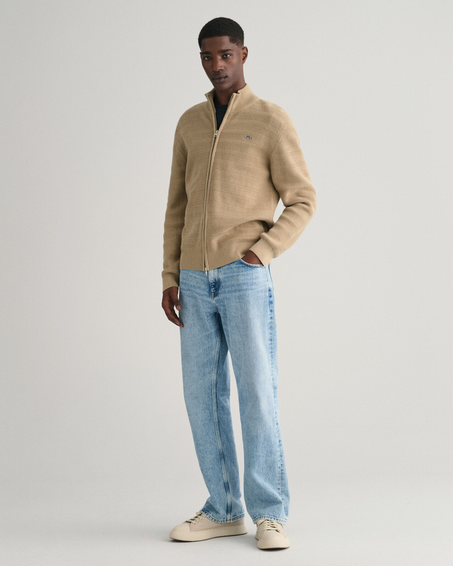 Cardigan con zip in cotone testurizzato a righe