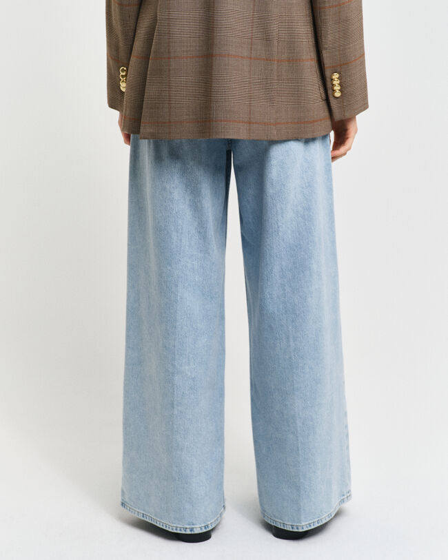 Jeans gamba ampia effetto stropicciato