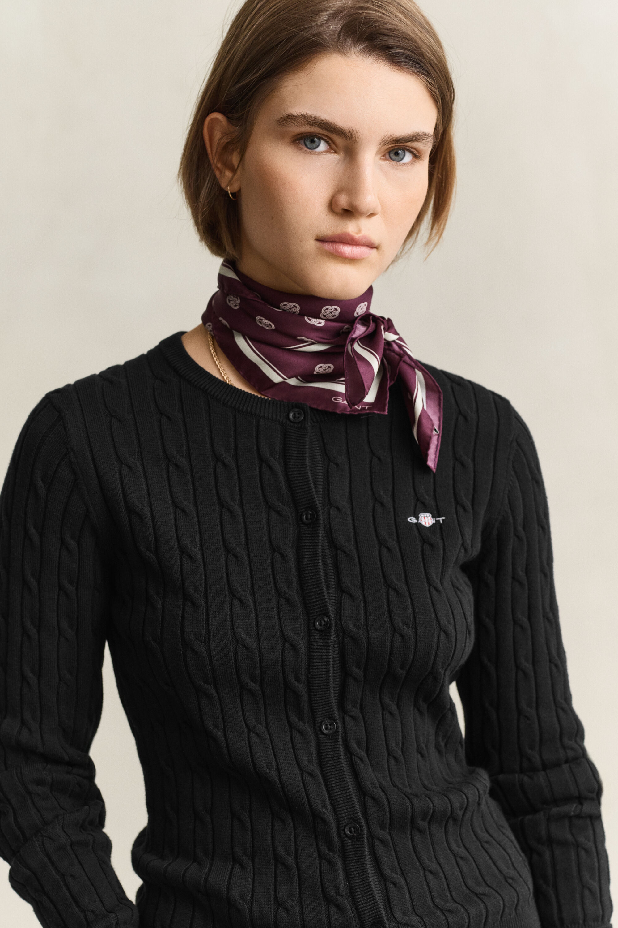 Cardigan in maglia con lavorazione a trecce