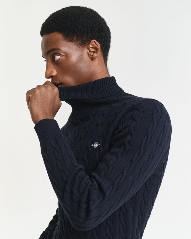 Maglia a collo alto in cotone a trecce