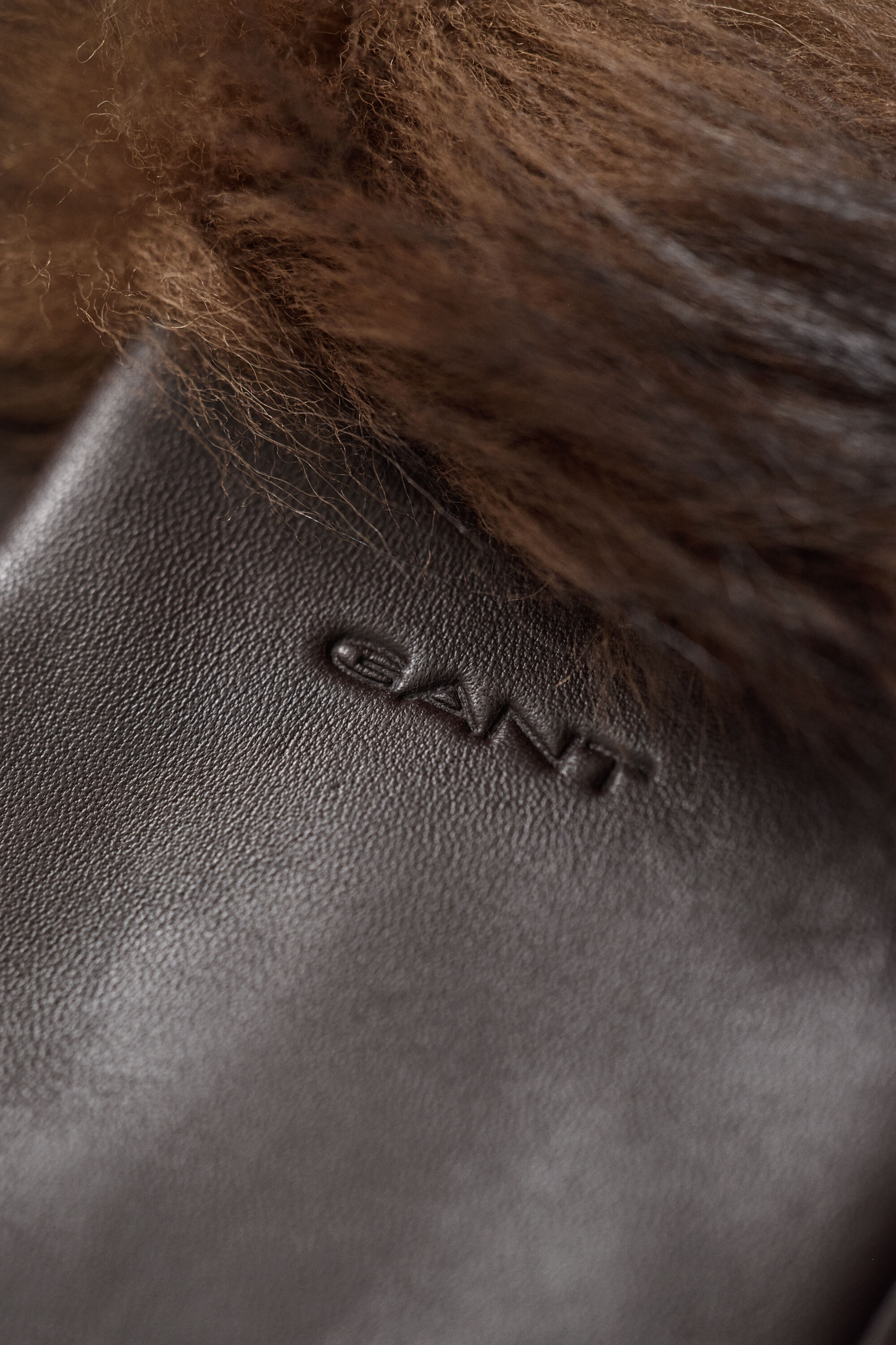 Guanti in pelle con polsini in shearling