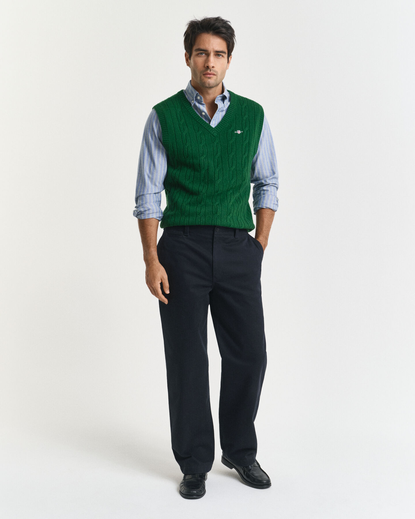 Piumino smanicato a trecce in morbida lana d’agnello