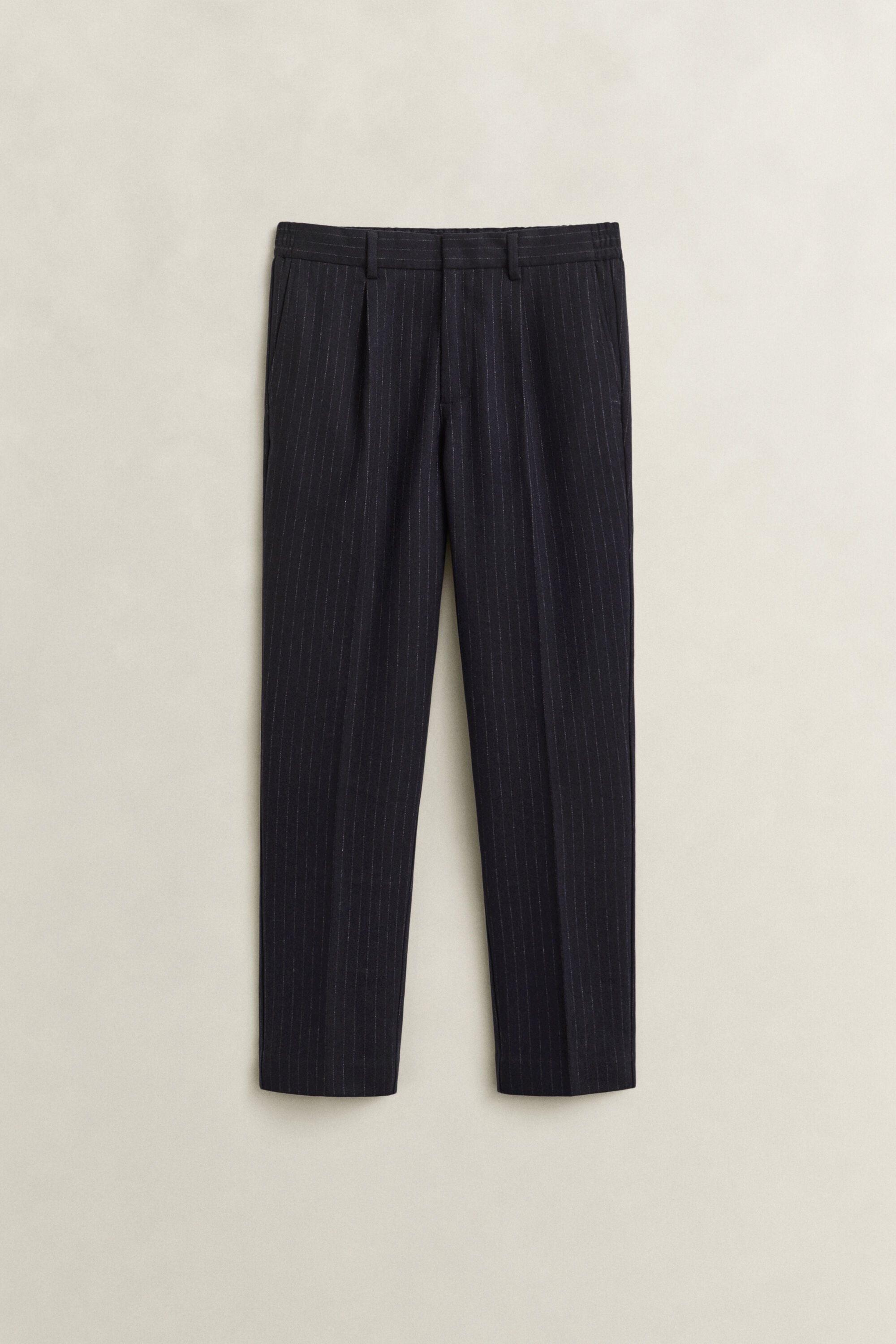 Pantaloni in flanella di lana stretti in fondo