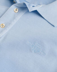 Polo in piqu&eacute; tinto a spruzzo