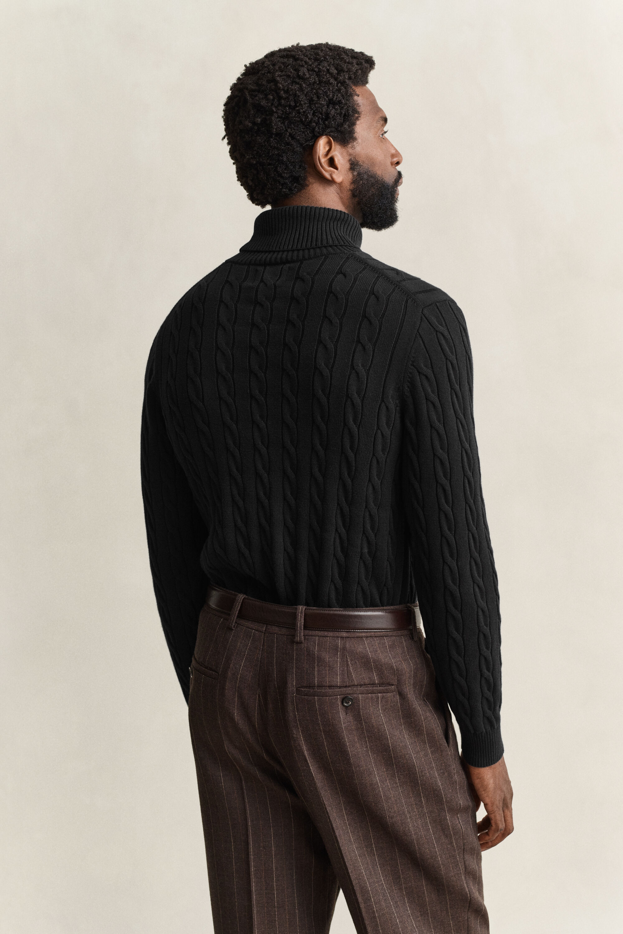 Maglia a collo alto in cotone a trecce