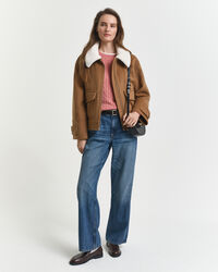 Maglia girocollo in cotone elasticizzato a trecce