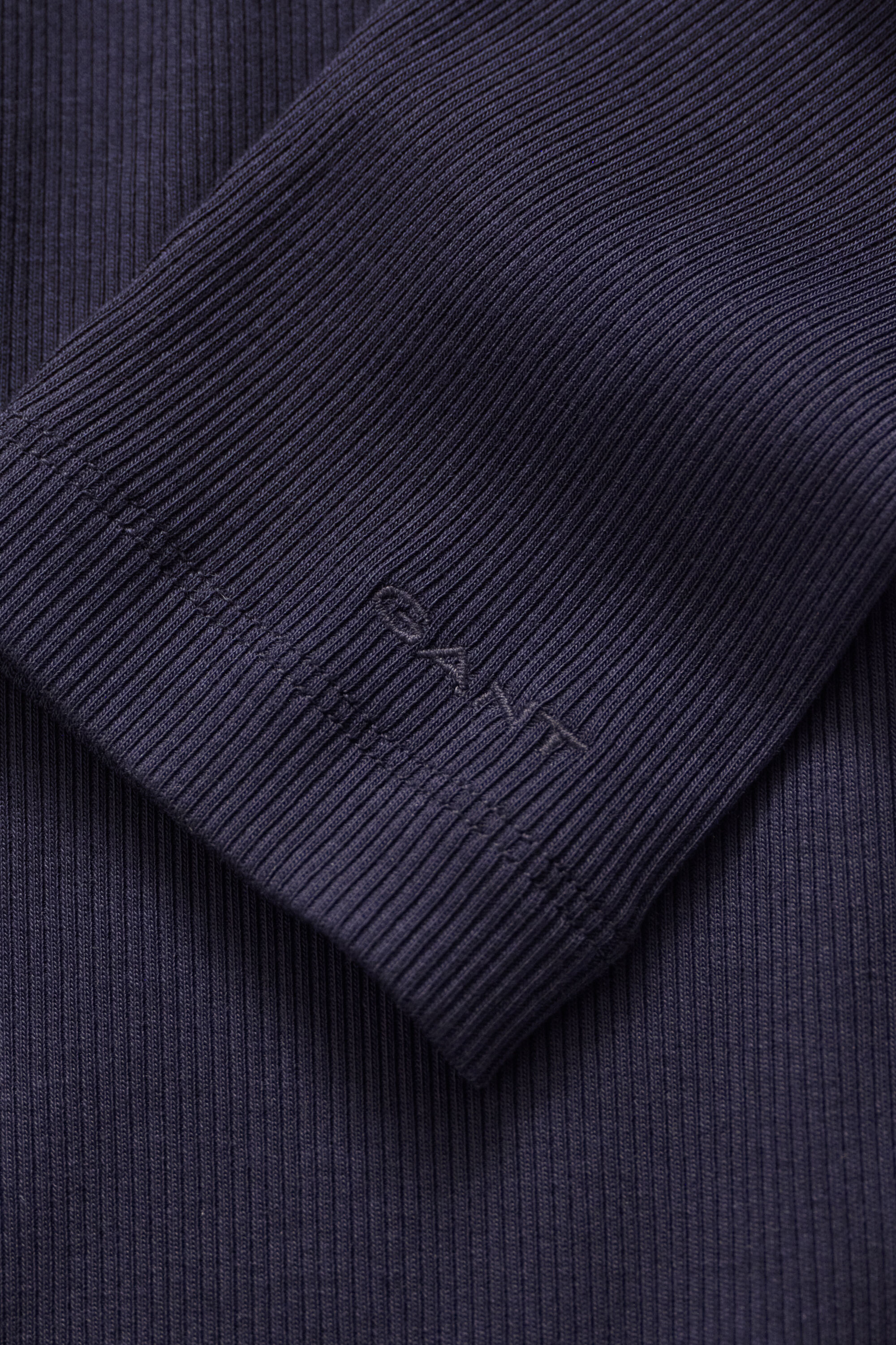 Maglia a collo alto a coste
