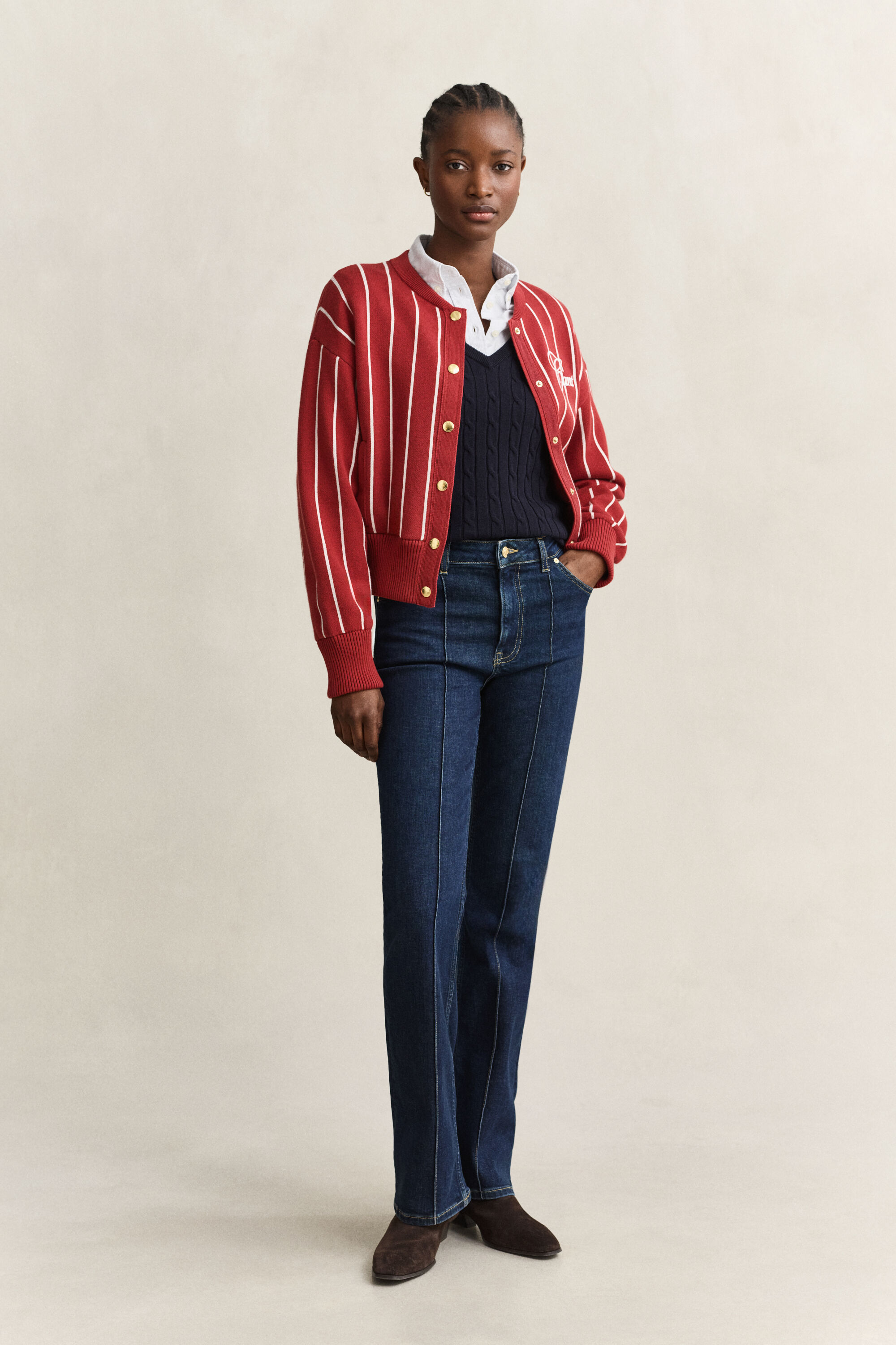 Maglia con scollo a V in cotone elasticizzato a trecce