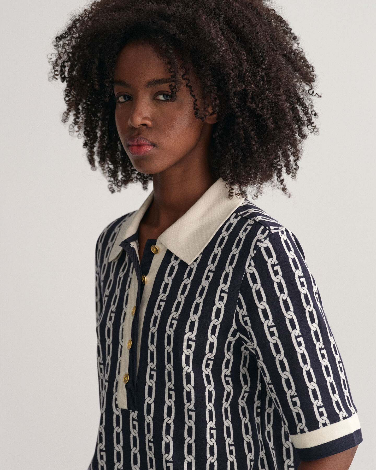 Polo a mezza manica e jacquard con catena