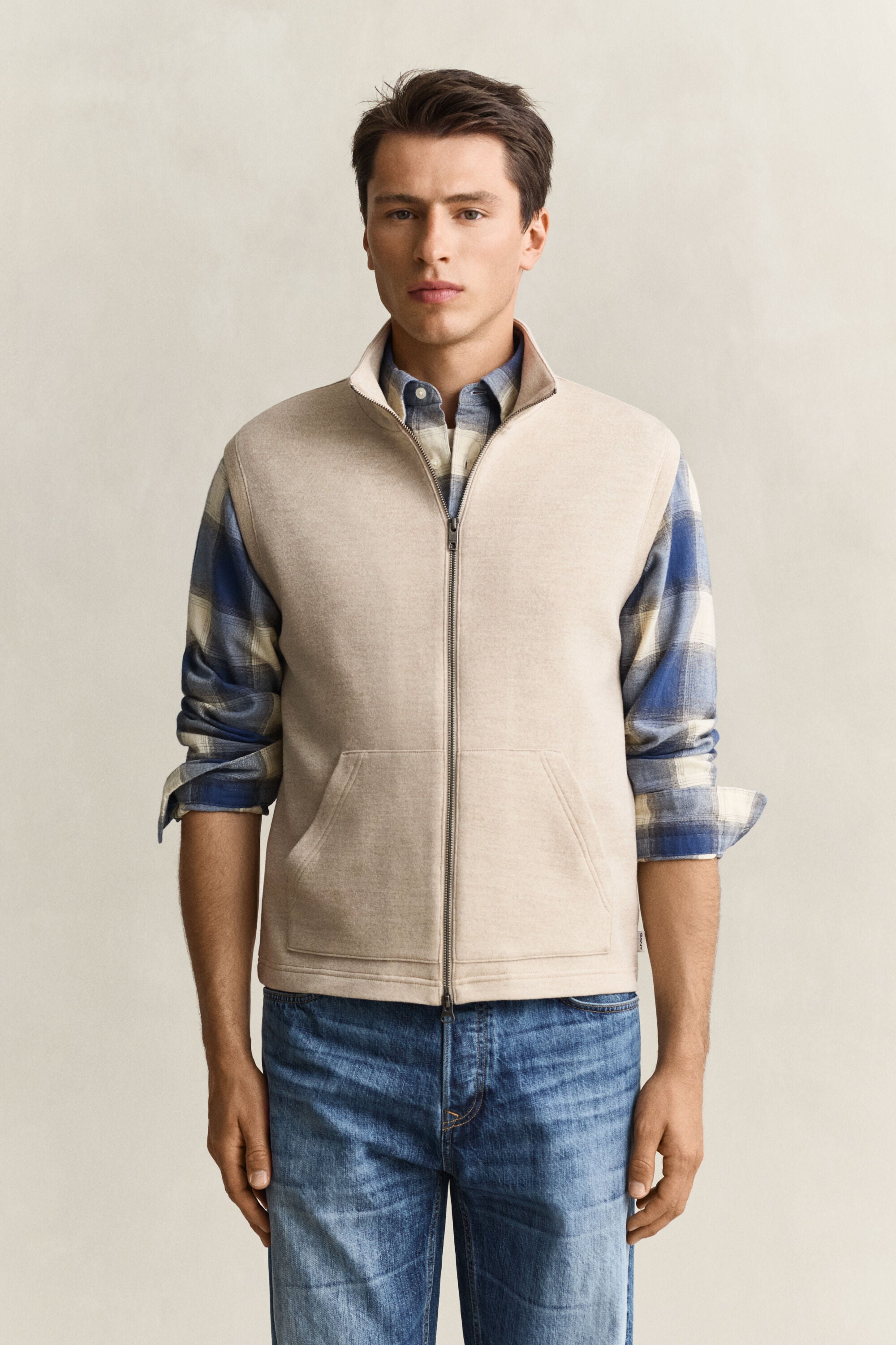 Piumino smanicato con zip