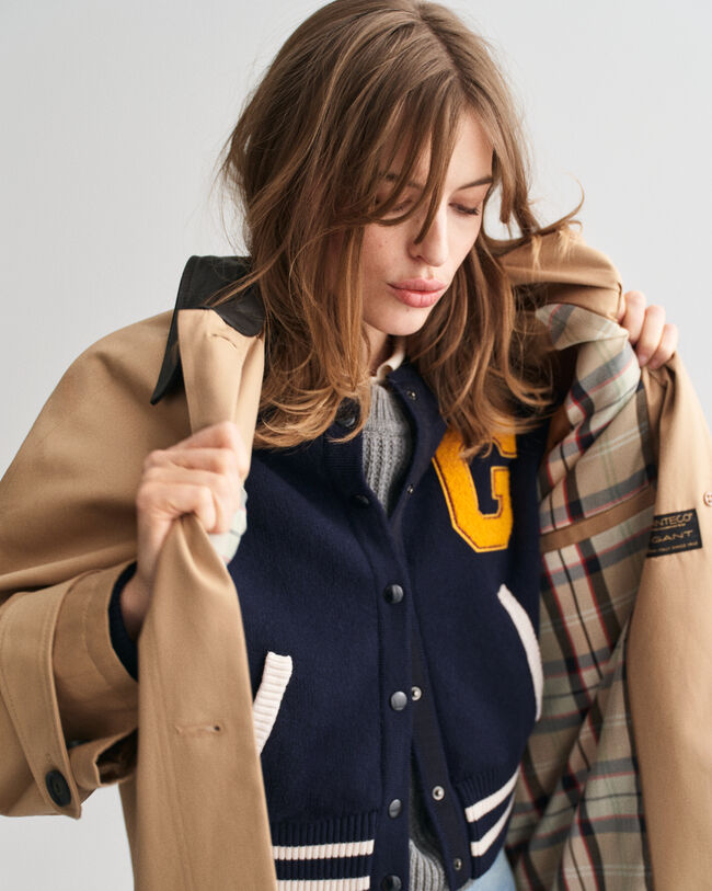 Impermeabile con colletto in pelle