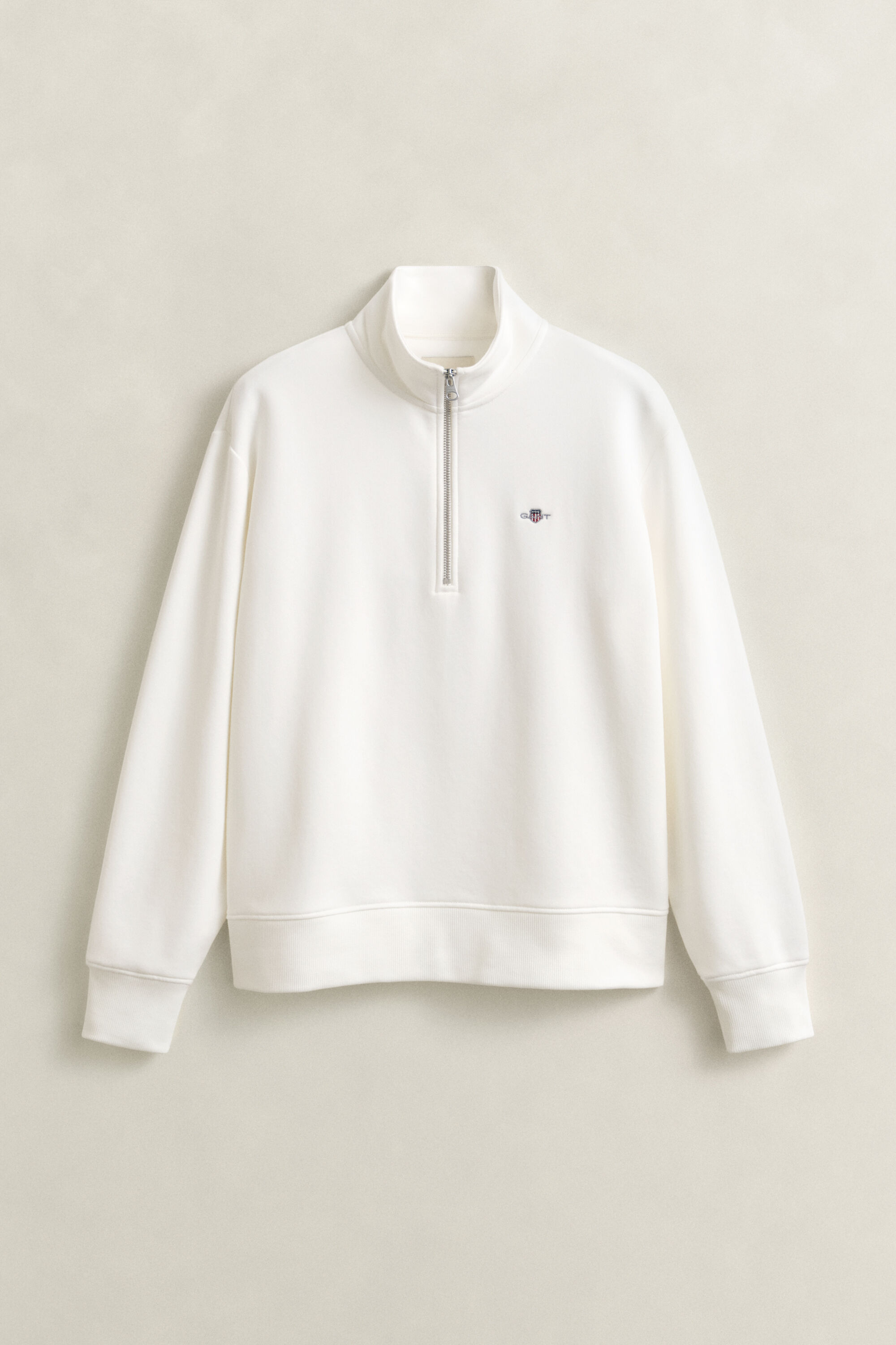 Felpa Shield con zip corta