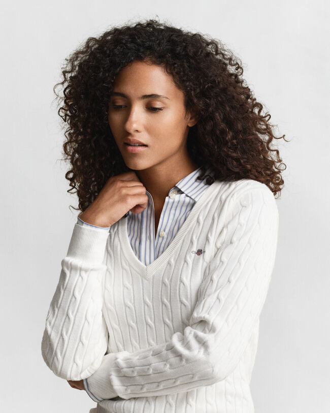 Maglia con scollo a V in cotone elasticizzato a trecce