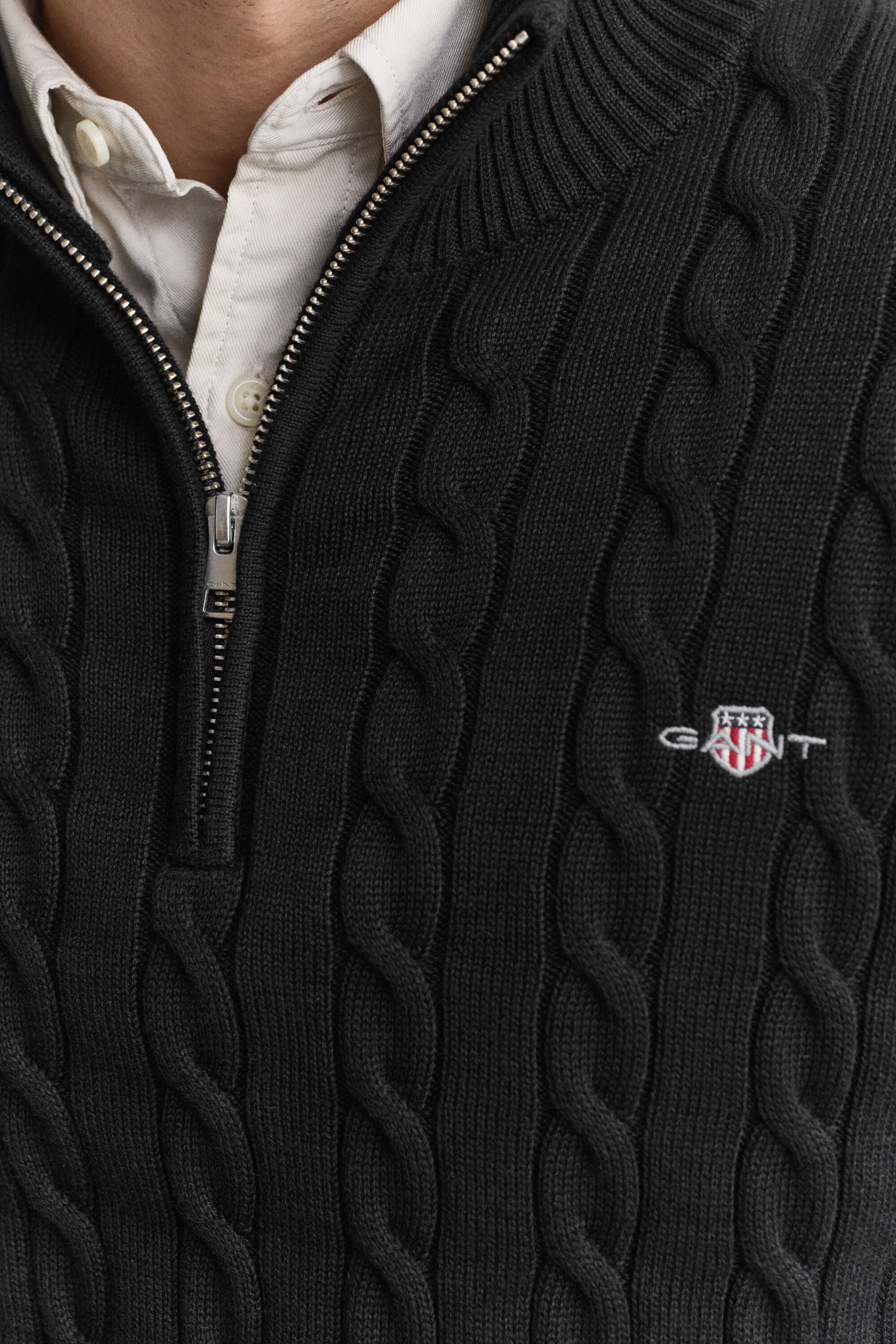 Maglia con zip corta in cotone a trecce
