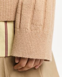 Maglia con scollo a V a coste larghe in lana