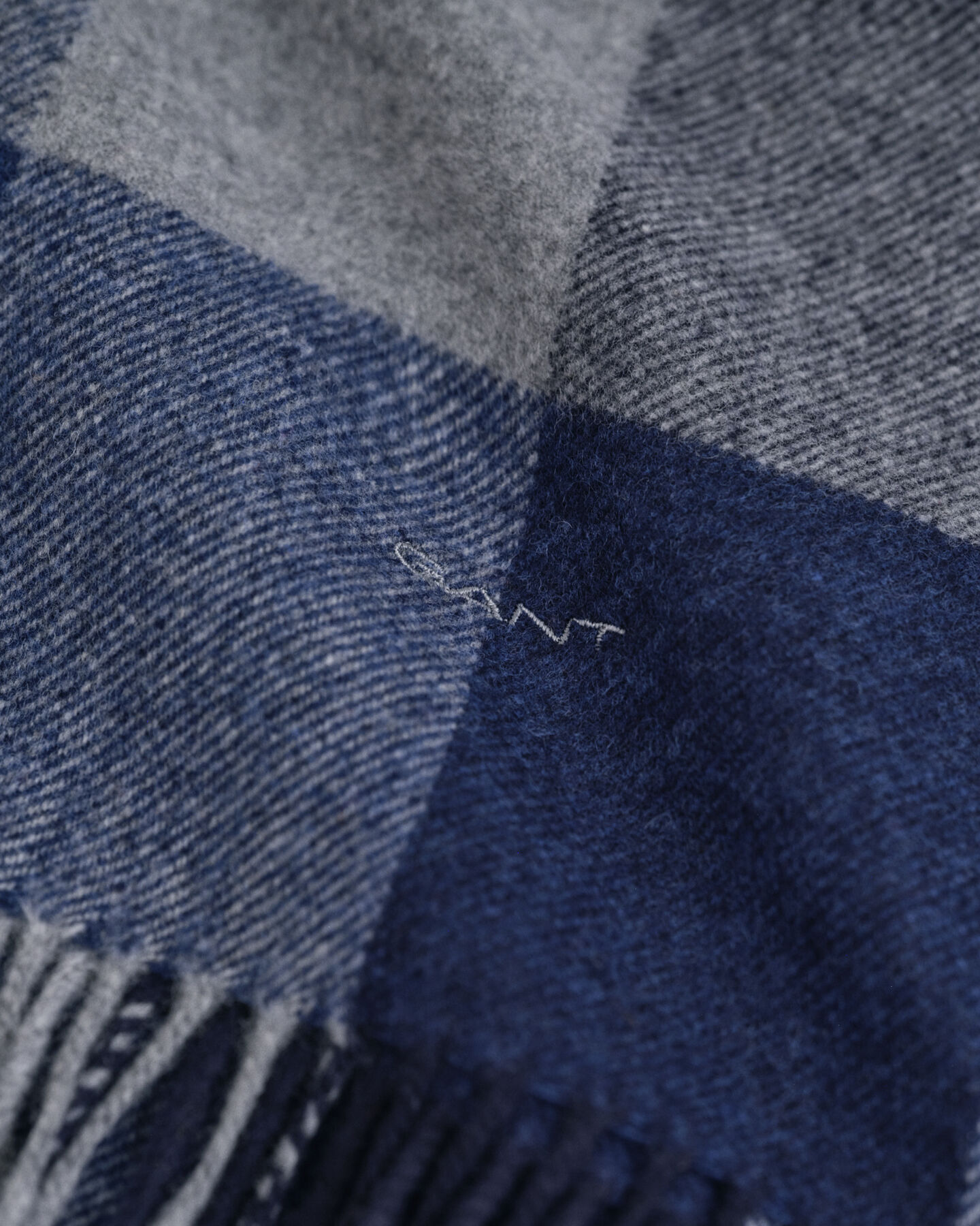 Sciarpa in lana a quadri dai colori vivaci