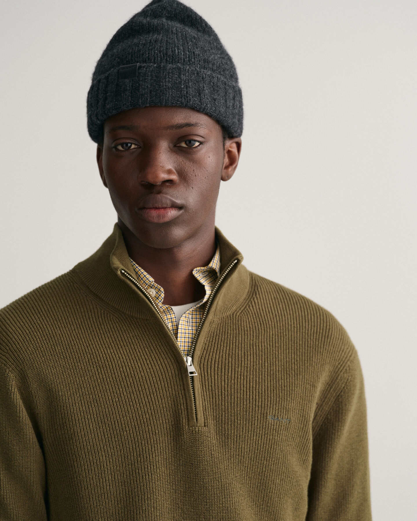 Maglia in cotone e lana a coste con zip corta