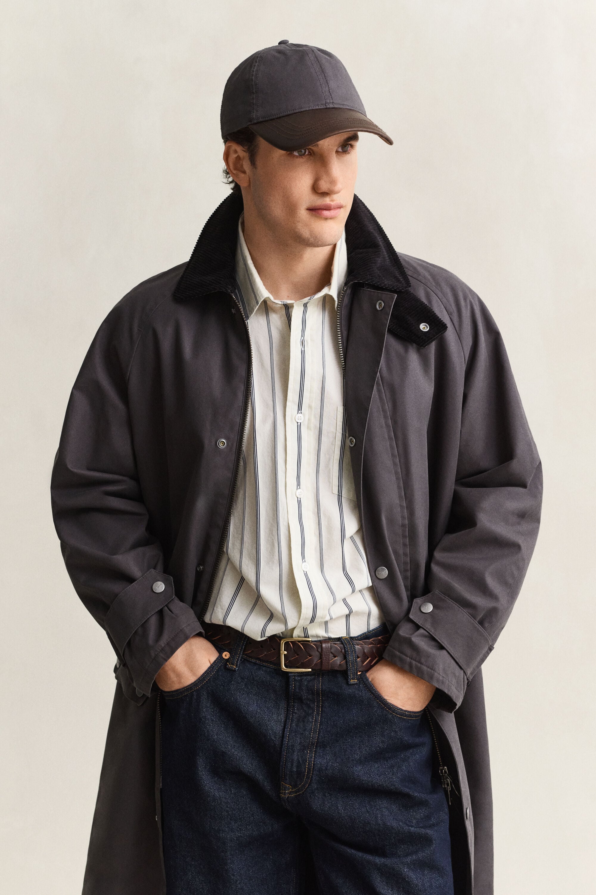 Cappellino con visiera in pelle cerata