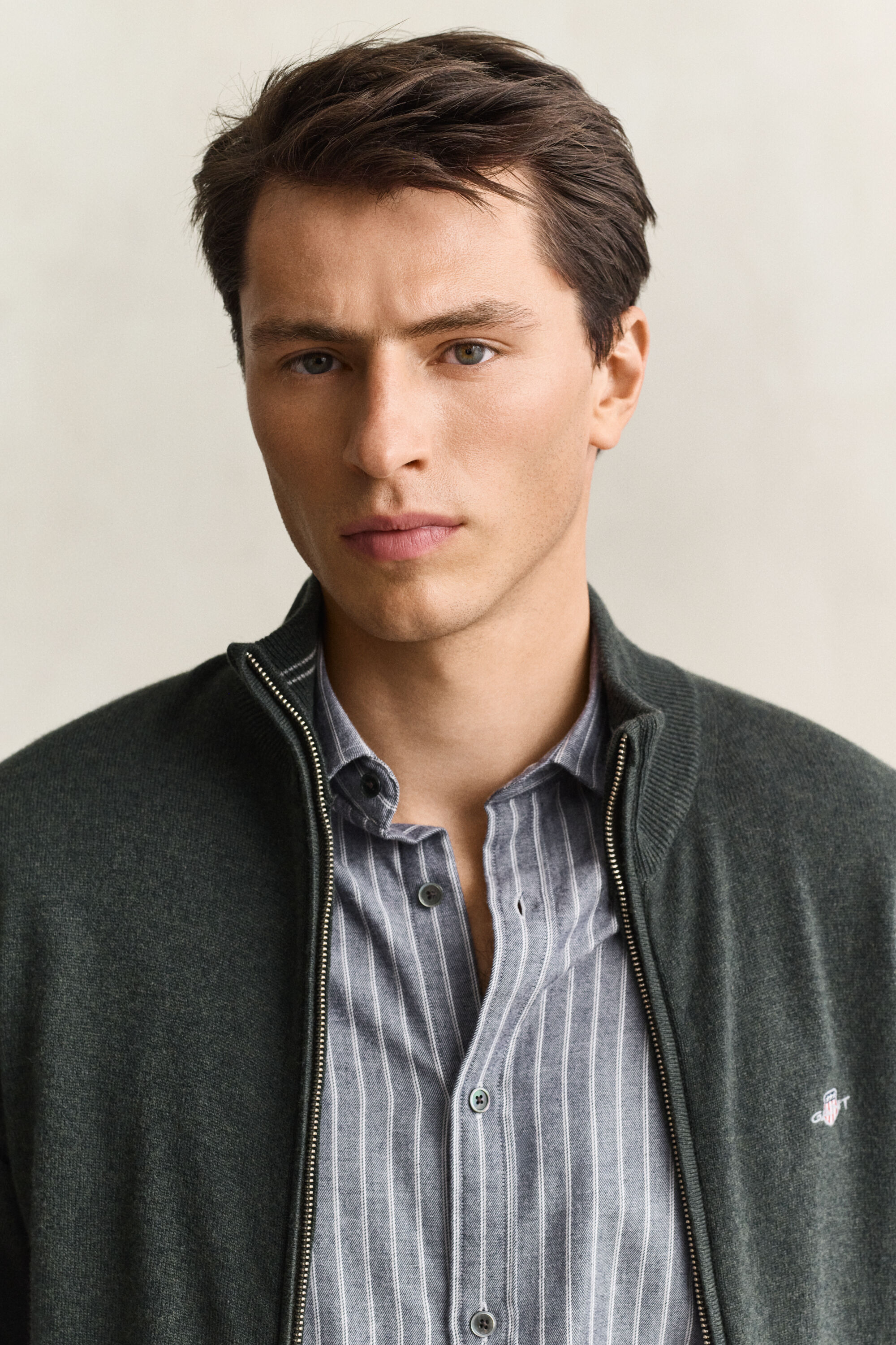 Cardigan con zip in lana d’agnello