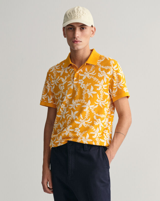 Polo in piqu&eacute; con stampa Palm Lei