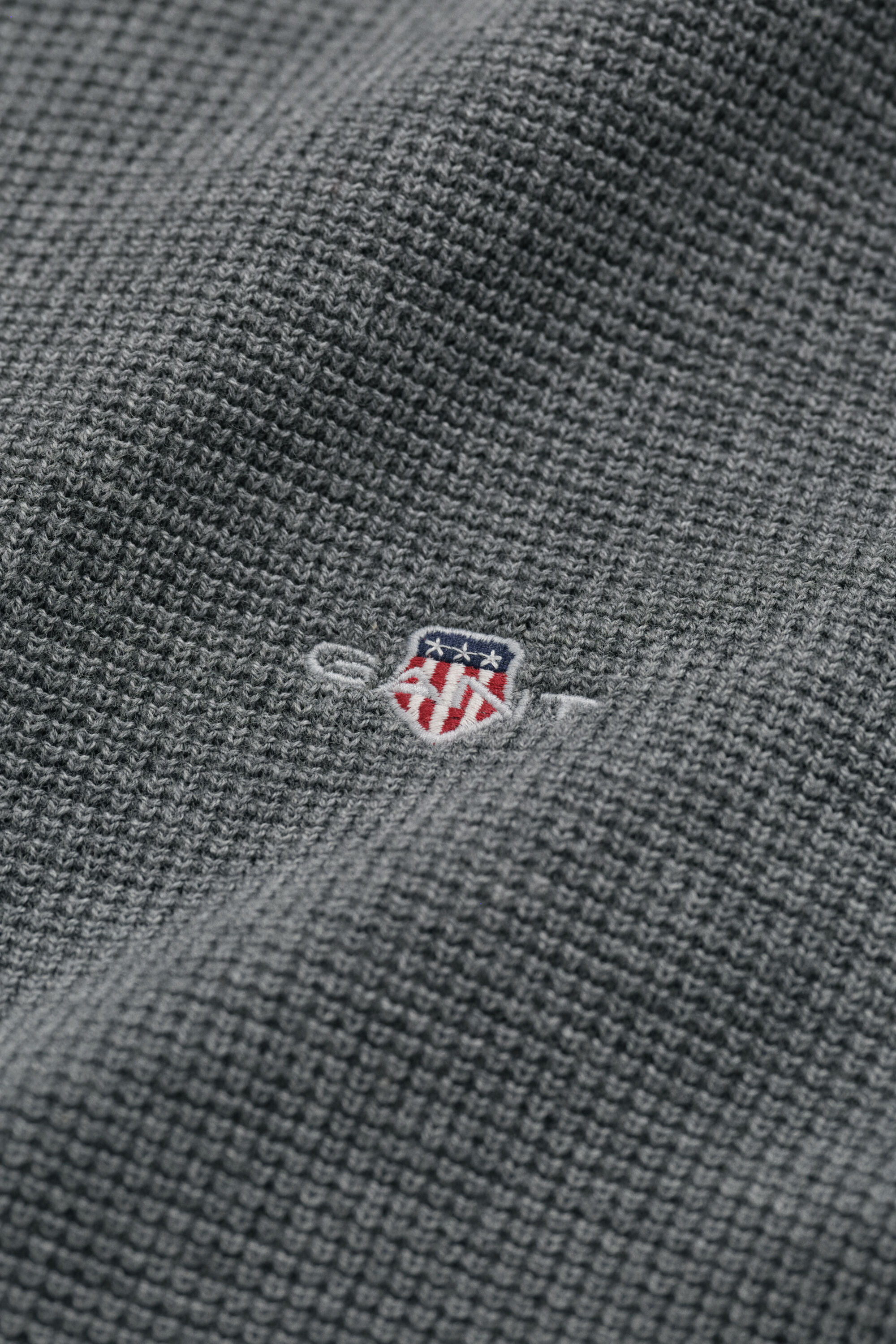 Maglia in cotone testurizzato con zip corta
